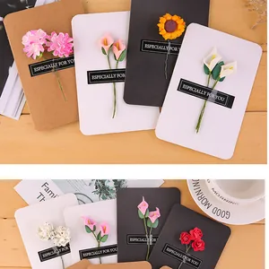 Close-up detail of handmade flower decorative retro kraft gift greeting cards