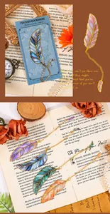 Elegant feather metal bookmarks with colorful enamel detail and golden chain for reading