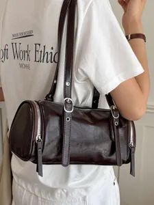 Vintage dark brown oily leather cylindrical pillow shoulder bag with silver hardware