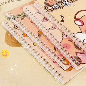 Close-up showing the sturdy double-coil spiral binding of the Capybara A5 notebook.