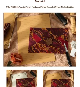 Gros plan sur l'enveloppe marbrée dorée 130g et le papier à lettres vintage kraft.
