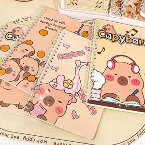 Close-up of cute Capybara cartoon spiral notebooks with student stationery design