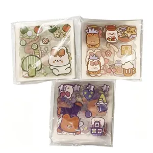 Detailed view of three packs of waterproof cute cartoon PET stickers for DIY journal decor