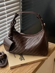 Elegant vintage brown woven dumpling shoulder bag with mini pouch accessory for women