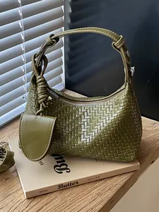 Elegant olive green woven hobo shoulder bag for women with matching mini pouch charm