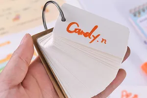 Detail shot showing the portable blank flashcard book with a sturdy metal ring binder.