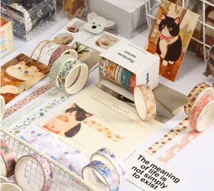 Variety of decorative cute cat and floral pattern washi tapes for DIY scrapbooking.