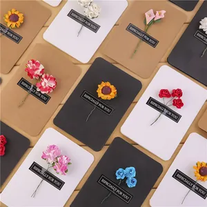 Vintage kraft paper greeting cards with handmade dried flowers for DIY gift decoration