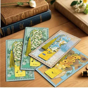 Vintage oil painting metal bookmarks with hollow design and yellow tassels set on old books