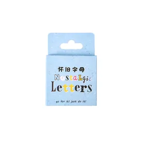 Minimalist nostalgic letter stickers in a light blue box for DIY journal decoration