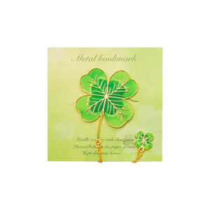 Exquisite green enamel four-leaf clover metal bookmark with delicate golden chain