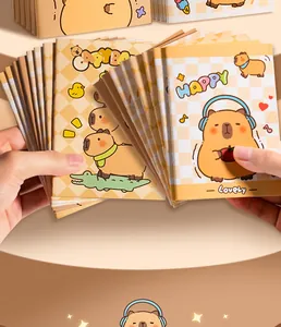 Pila de mini cuadernos de bolsillo con lindas ilustraciones de capibara de dibujos
