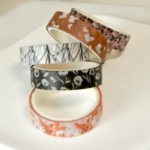 Decorative floral washi tape set with elegant spring blossom patterns for DIY journaling.