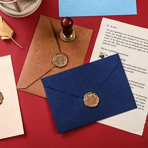 Sobres de papel texturizado de primera calidad con sellos de lacre para invitaciones