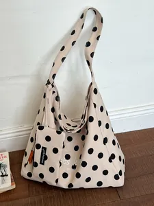 Large capacity cream canvas tote bag with black polka dots and matching small pouch