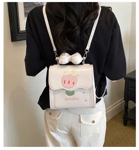 Élégant petit sac à dos blanc crème avec broderie tulipe et noeud mignon pour femmes