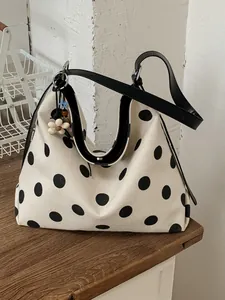 Bolso tote de lona con lunares de gran capacidad y correa negra para uso diario