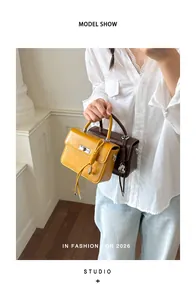 Set di mini borse vintage in giallo e marrone con chiusura a scatto per donna