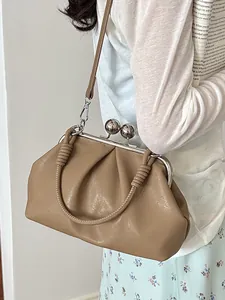 Elegant beige pleated handbag for women with metal kiss-lock closure and crossbody strap