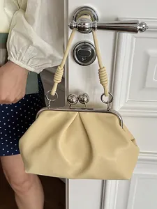 Elegant pleated shell handbag in cream yellow for women's summer fashion style
