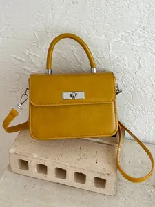 Piccola borsa a mano vintage elegante giallo senape da donna con chiusura argento e tracolla
