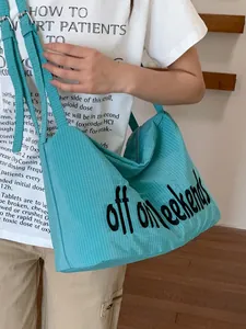 Large capacity light blue nylon tote bag with 'off on weekends' print for casual wear