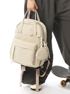 Stylish minimalist cream nylon backpack for women with small coin purse attachment