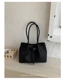 Sophisticated black commuter tote bag with large capacity and minimalist retro design