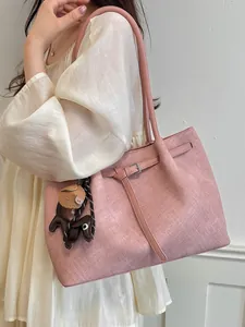 Large capacity pink women's commuting tote bag with dog charm and textured finish