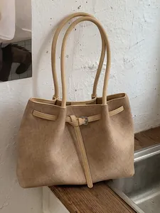 Large capacity beige textured commuter tote bag featuring decorative buckle detail