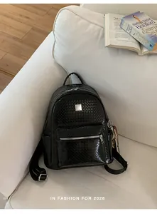 Stylish black large-capacity woven backpack for women in a modern lifestyle setting.