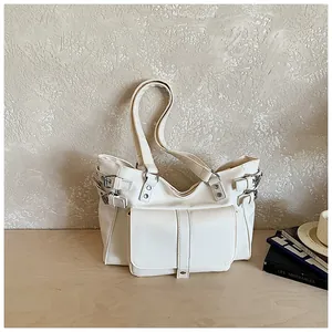 Stylish white large capacity commuter tote bag with buckle details on wood surface