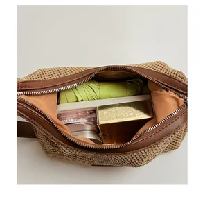 Detail view of a woven shoulder bag interior showing spacious capacity for essentials