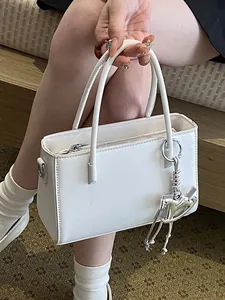 Elegant white top-handle handbag with silver horse charm for women, minimalist trendy crossbody