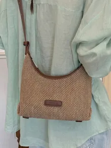 Casual woven underarm bag with dumpling shape and brown faux leather trim for women