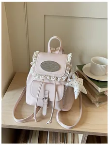 Pink vintage mini backpack with lace trim and adjustable straps for casual daily wear
