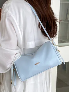 Minimalistische hellblaue Kissentasche für Damen für den täglichen Pendler-Stil