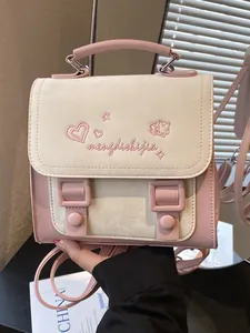 Elegant pink and beige women's mini backpack with embroidered heart details for travel