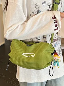 Green grid pattern canvas crossbody bag for women, stylish and casual shoulder bag