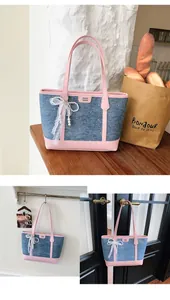 Denim tote bag with pink trim and lace pearl bow charm, showing various display angles.