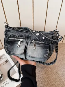 Trendy vintage washed denim crossbody bag with multi-pocket and silver rivet details