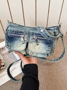 Stylish vintage washed denim shoulder bag with multiple zipper pockets for casual wear.