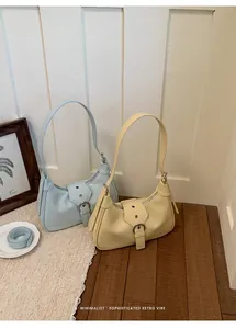 Bolsos de hombro hobo retro minimalistas en cuero sintético azul claro y amarillo