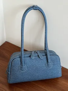Stylish blue denim Boston pillow bag with long shoulder straps for women's daily commute