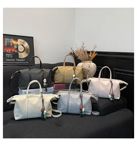 Five colors of large capacity canvas tote bags for women displayed in a lifestyle setting