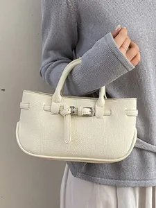 Elegant cream white pebbled leather handbag with silver buckle detail for daily commute