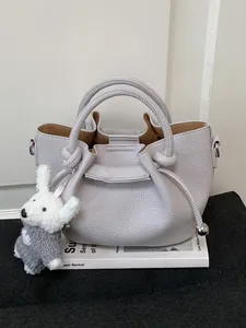 Elegant lavender leather bucket bag with cute rabbit charm for women's daily commute