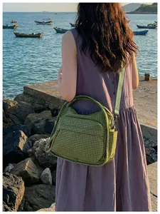 Green checkered nylon crossbody bag for women, lightweight commuter handbag lifestyle view