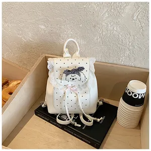 Sweet white polka dot mini backpack with elegant lace trim and cute dog illustration detail