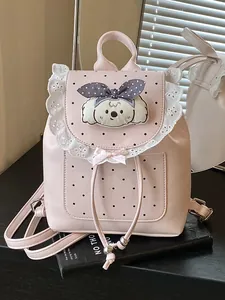 Sweet pink mini backpack featuring delicate lace trim and a cute cartoon dog patch